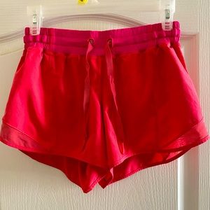 Lululemon running short with liner pink orange